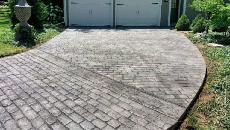 Enhance your outdoor space with the stamped concrete magic in Grand Rapids.